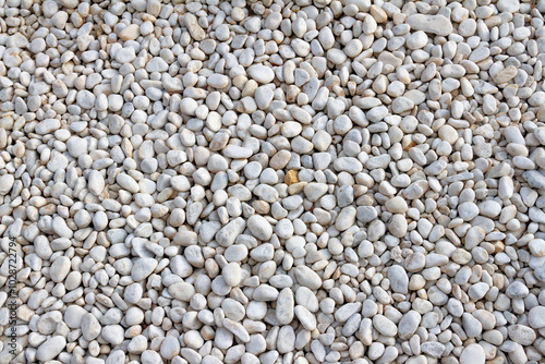 Foto White pebble stones background texture