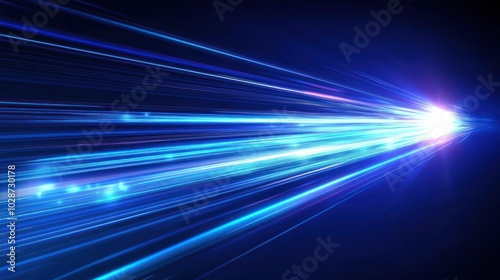 Digital image of light rays, lines with blue light, speed and motion blur on dark blue background