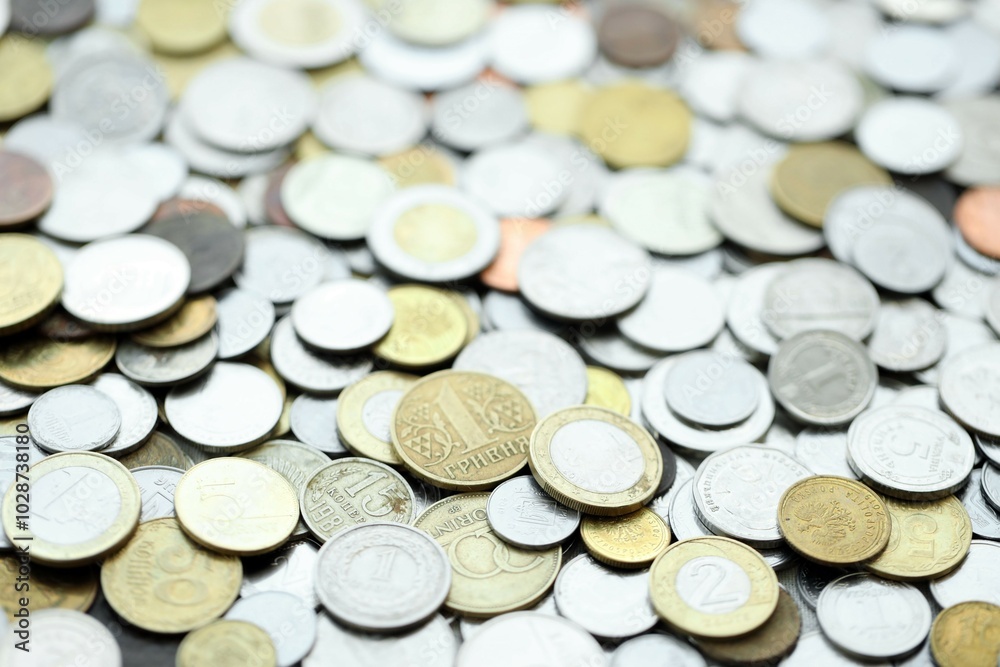 Big pile of different coins from various currencies and different countries around the world. Currency exchange Big pile of different coins from various currencies and different countries around the world. Currency exchange