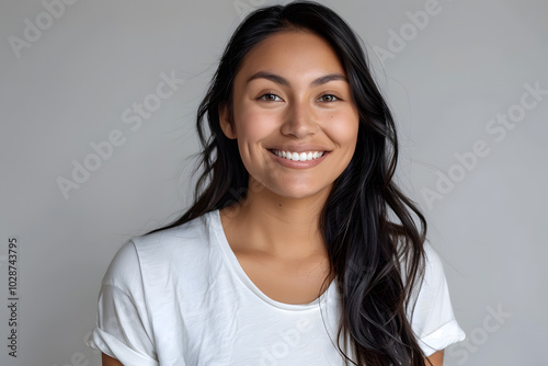Portrait of native American smiling woman wearing white t-shirt isolated on white background photo