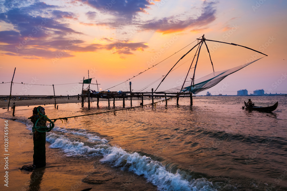 Kochi Chinese fishnets on sunset in Fort Kochin, Kochi, Kerala, India Kochi Chinese fishnets on sunset in Fort Kochin, Kochi, Kerala, India