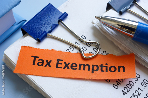 Tax exemption documents on a table. photo