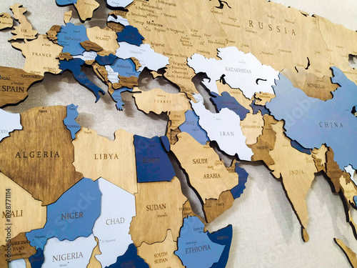 Near East And South Africa on the political map. Iraq, Iran, Israel, Iordan, Armenia, Azerbajan, Syria, Turkey, Egypt, Saudi, Sudan, Chad, Yemen, Tunisia. Arabia on wooden world map on the wall. photo