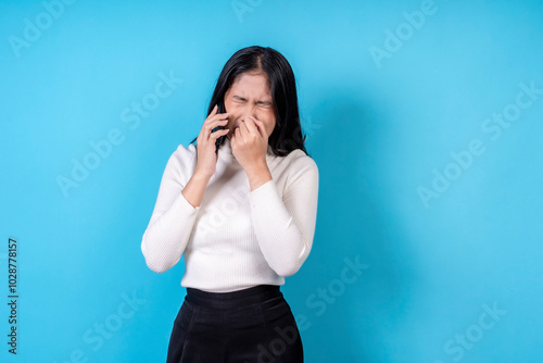 Women are doing various poses on a blue background.