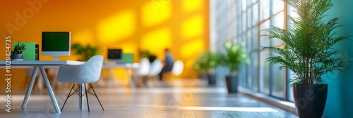 Bright modern office space with creative workstations and plants during dayti...