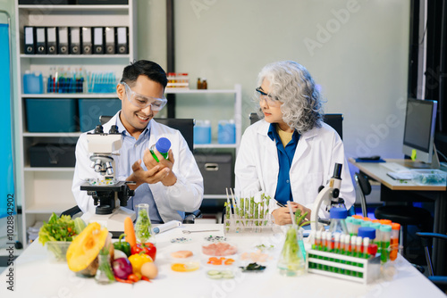 Food scientists in lab coats, testing samples, and analyzing food safety and quality in a modern laboratory