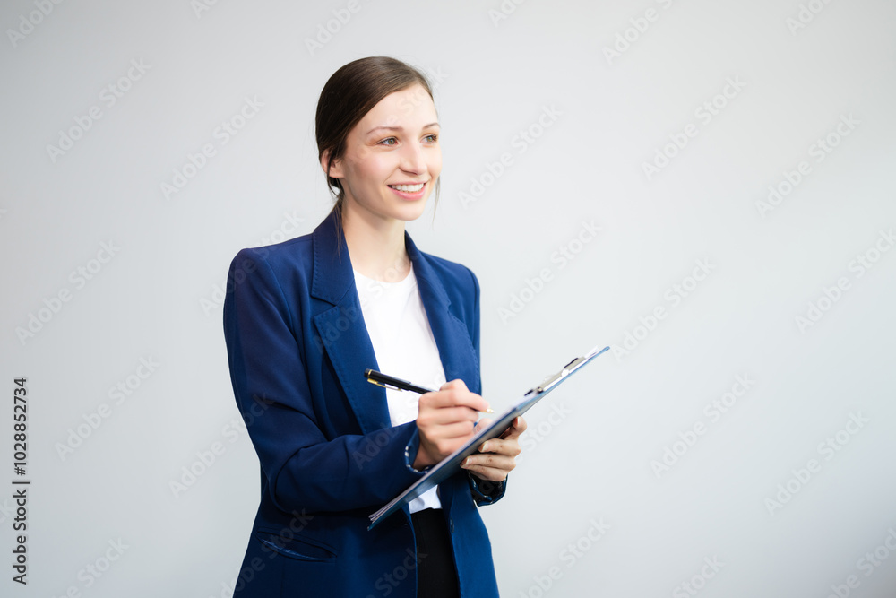 Confident Caucasian businesswoman CEO idea holding tablet and laptop for remote work, online viewing, multitasking isolated Confident Caucasian businesswoman CEO idea holding tablet and laptop for remote work, online viewing, multitasking isolated
