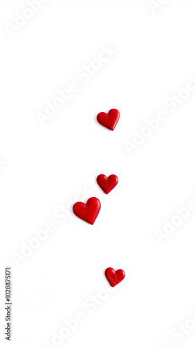 four red hearts on a white background