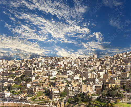 Amman city landmarks-- old roman Citadel Hill, Jordan. Against the background of a beautiful sky with clouds