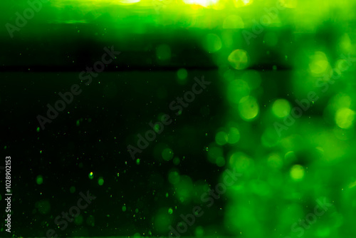 Concept Green Sparkling Lights Festive bokeh abstract Christmas twinkled bright bokeh defocused