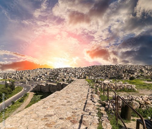 Amman city landmarks-- old roman Citadel Hill, Jordan. Against the background of a beautiful sky with clouds