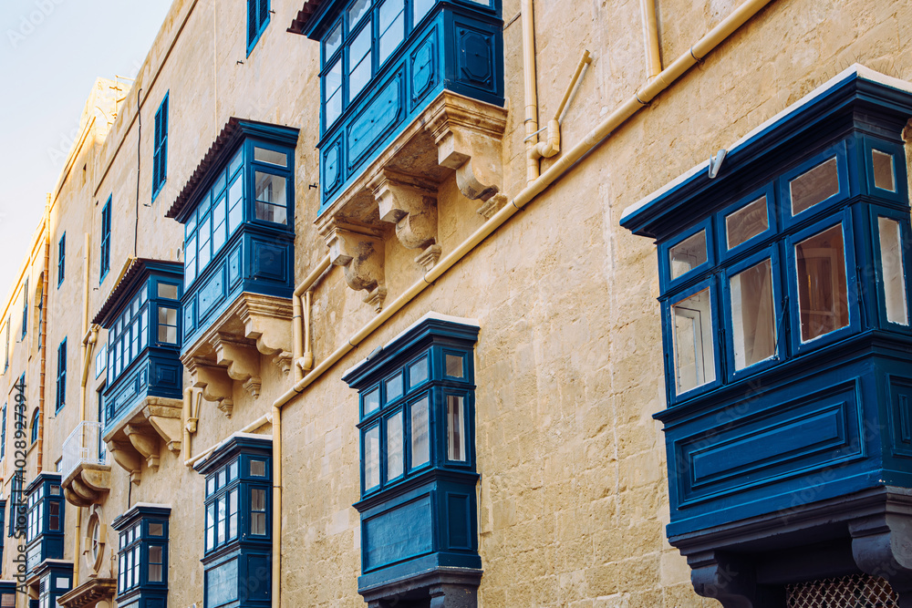 Beautiful old town in Malta, Valletta with traditional blue wooden Maltese balconies called The Gallarija. Beautiful old town in Malta, Valletta with traditional blue wooden Maltese balconies called The Gallarija.