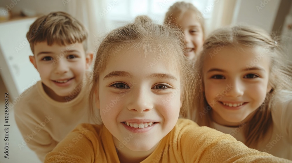 POV of a group of cheerful children, smiling and looking directly at the camera, as if taking a selfie together at home. Simple, cozy background. POV of a group of cheerful children, smiling and looking directly at the camera, as if taking a selfie together at home. Simple, cozy background.