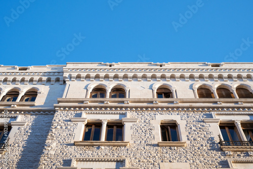 Building facade in the Umbertino district of the city of Bari in Italy photo