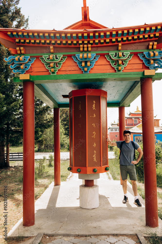 Ivolginsky datsan tourist man stands in Ulan-Ude. Russia Ivolginsky datsan tourist man stands in Ulan-Ude. Russia