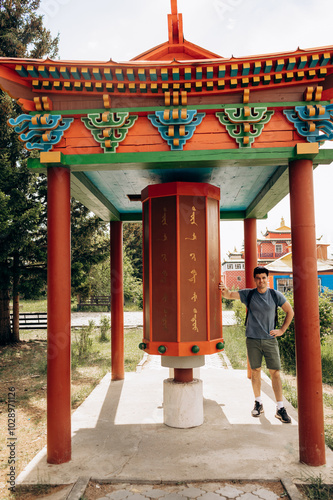  Ivolginsky datsan tourist man stands in Ulan-Ude. Russia photo