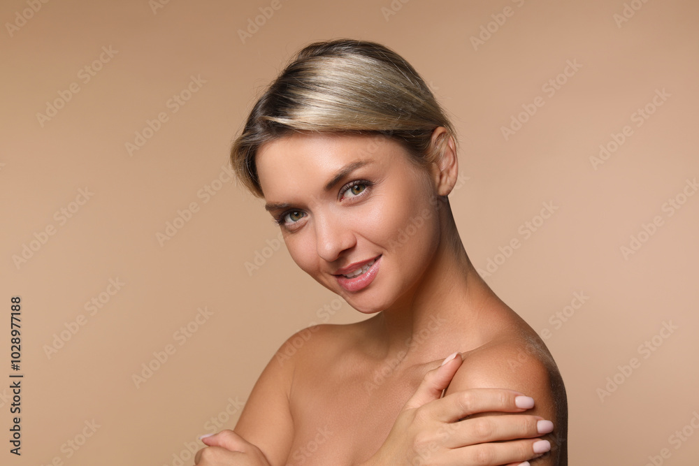 Cosmetology. Beautiful woman with perfect skin on beige background Cosmetology. Beautiful woman with perfect skin on beige background