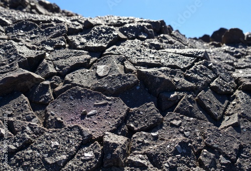 high Schist Outcrop Glittering schist with flakes of mica reflec photo