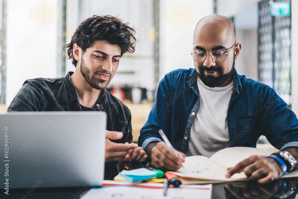 Coworking men designing new project in team