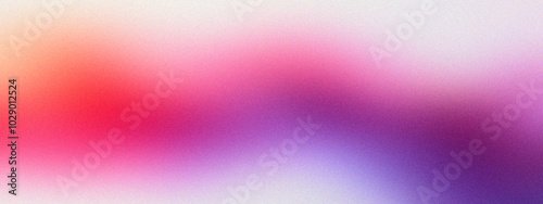 Trendy colorful abstract grainy background. Light bright mash gradient. Vivid colors noise texture on dark grainy background: a vibrant color gradient of pink, yellow, magenta and purple, abstract photo