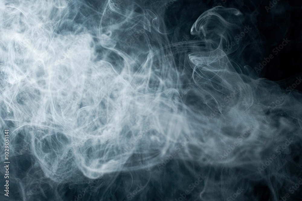 Abstract Smoke Swirling and Dissolving Against a Black Background Abstract Smoke Swirling and Dissolving Against a Black Background