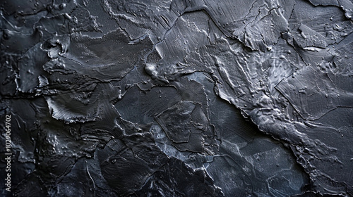 Deep charcoal gray with a slight metallic shimmer and subtle texture variations. photo