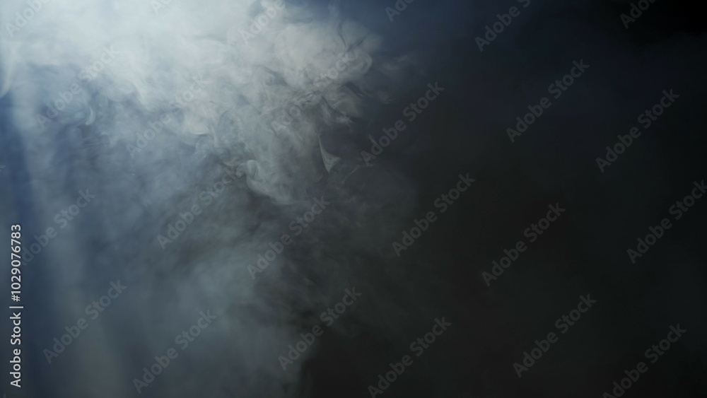 Soft diffused rays of light cut through the hazy darkness. Soft diffused rays of light cut through the hazy darkness.