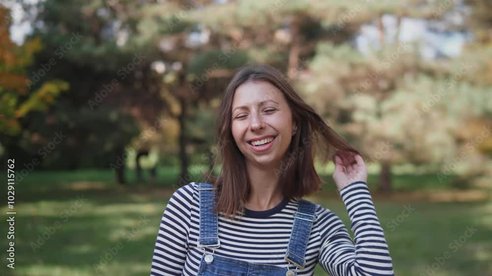 beautiful and happy middle-aged woman portrait in spring or summer in a city park beautiful and happy middle-aged woman portrait in spring or summer in a city park