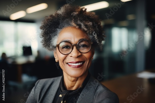 Portrait of a smiling senior African American businesswoman in office