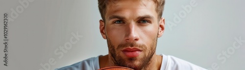 Man with basketball jersey, white background, sports attire photo