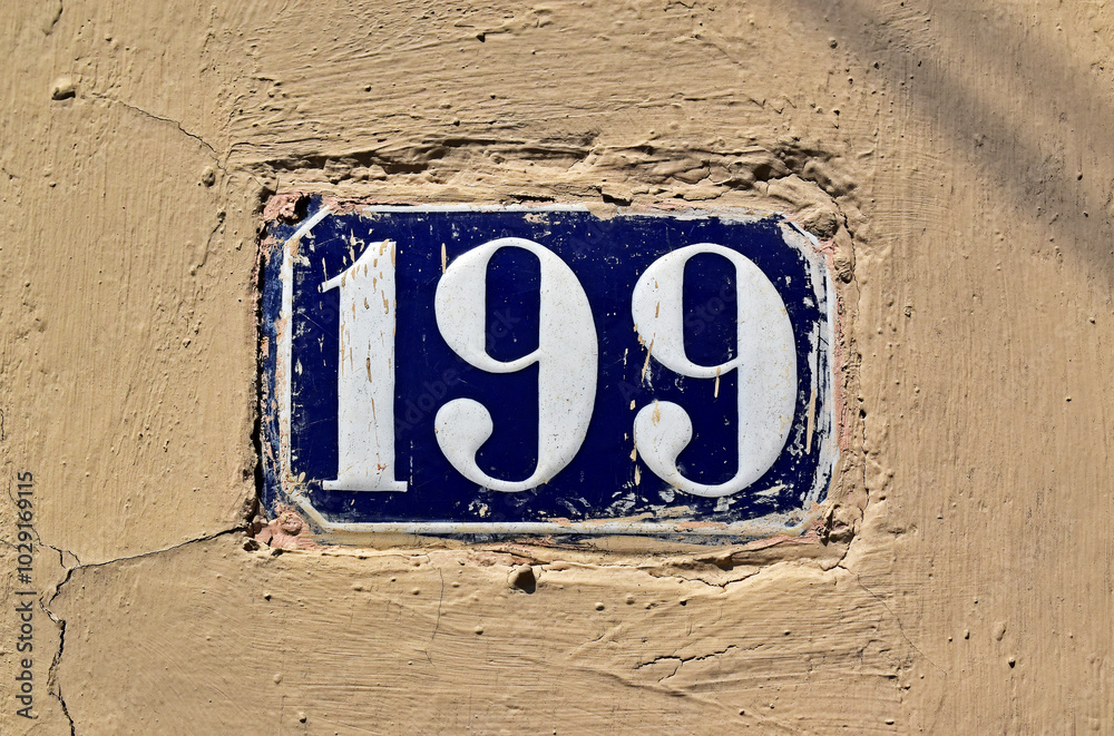 Street sign number 199 on wall in the Tijuca neighborhood, Rio de Janeiro, Brazil