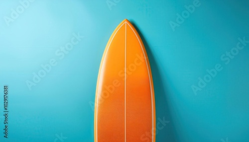  Vibrant Orange Surfboard Tip Against Bright Blue Background. Ideal for Beach, Surfing Lifestyle, Summer Sports, Adventure Themes, Water Sports Promotions, and Surf Gear Advertising photo