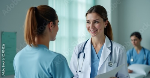 Doctor in a white coat and nurse at a consultation.