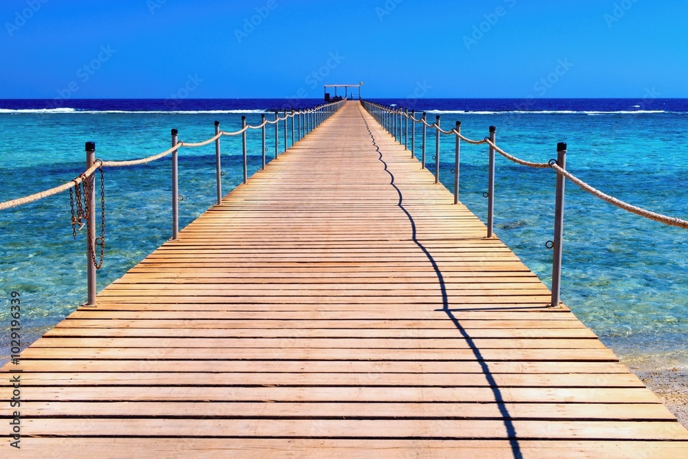 Fototapeta premium Idylic beach with wooden jetty, Red Sea, Egypt
