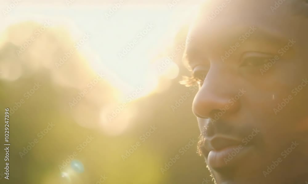 Trinidadian Man Relaxing on Park Bench in Afternoon Sun Trinidadian Man Relaxing on Park Bench in Afternoon Sun