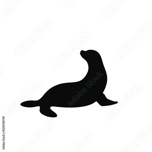 A black silhouette of a sea lion or seal on a white background 