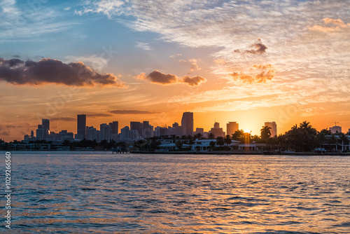 Miami skyline sunset of downtown Florida cityscape city by Venetian causeway bridge, residential houses buildings skyscrapers photo