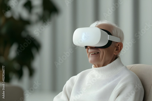 An elderly man smiling while wearing a virtual reality headset