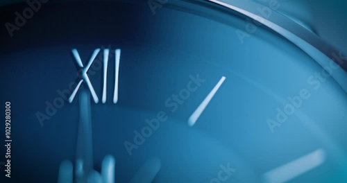 Close up of a ticking watch face