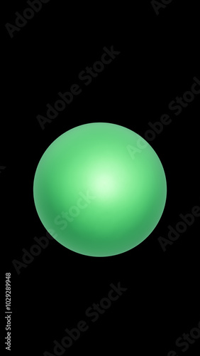 green ball on black background