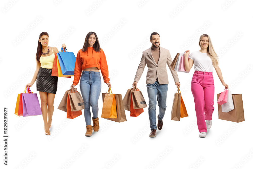 Group of young people walking with shopping bags Group of young people walking with shopping bags