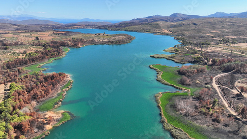 Aerial drone photo of lake and dam of Marathon after mega fires of Athens in August 2024, Attica, Greece