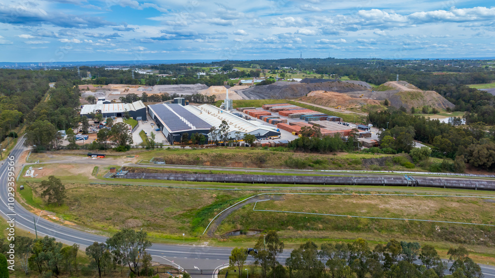 Drone aerial photograph of an industrial site and sand quarry in Eastern Creek in regional Sydney in New South Wales, Australia. Drone aerial photograph of an industrial site and sand quarry in Eastern Creek in regional Sydney in New South Wales, Australia.