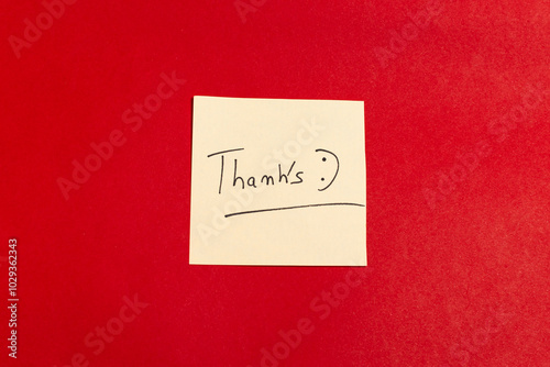 A thank you note is written on a red background