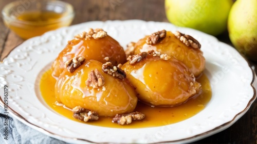 Pear halves drizzled with honey and sprinkled with walnuts, cooked in a deep fryer.