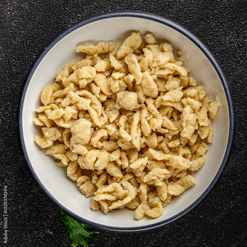 pasta spaetzle irregular shape fresh meal food snack on the table copy space food background rustic top view pasta spaetzle irregular shape fresh meal food snack on the table copy space food background rustic top view