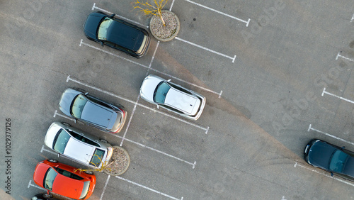 Aerial View of Sparse Parking Lot with Few Cars