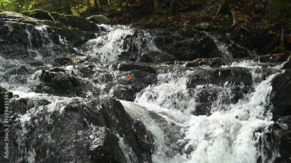 A waterfall from a mountain stream in autumn, slow motion, Josefsthaler Wasserfälle A waterfall from a mountain stream in autumn, slow motion, Josefsthaler Wasserfälle