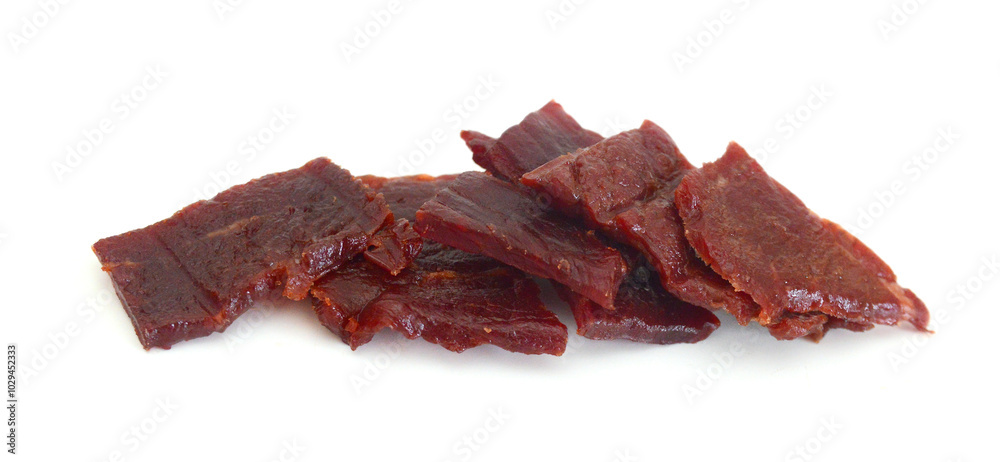 Beef jerky pieces on white background Beef jerky pieces on white background