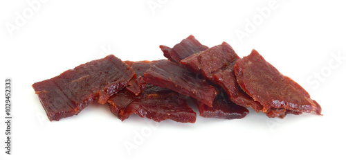 Fotografía Beef jerky pieces on white background